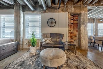 Preserved historic plaster and exposed brick walls